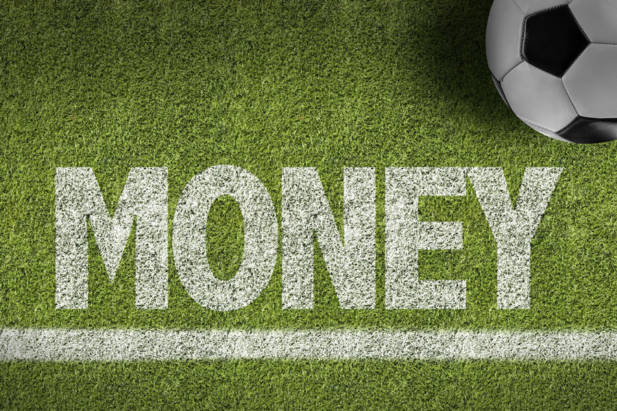Money and success: over- and under-performing teams